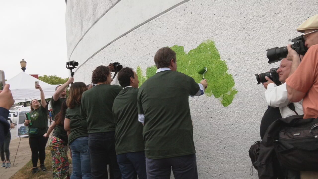 Humana employees paint parking garage on Community Day